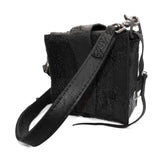 a mini box bag patterned from a full grain reverse horse culatta leather and hand stitched with a japanese linen thread without the use of machines. the bag features a riri zipper closure, double layer hand stitched detachable shoulder strap and hand forged iron and .925 sterling silver hardware. the interior pocket is adorned with a riri zipper and solid .925 sterling silver zipper pull. available from avant garde leather studio atelierskn.com