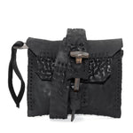 a zipper pocket cardholder crafted from a butter soft reverse horse culatta leather with a matte black object dyed finish in a single piece pattern construction. a riri zipper pocket is adorned with a hand forged solid .925sterling silver zipper pull, which compliments the hand forged solid bronze nail closure, available to buy online from artisanal leather studio atelierskn.com