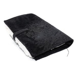 Hand stitched matte black reverse horse culatta leather journal cover with a hand forged solid .925 sterling silver buckle closure and multiple pages of 150gsm handmade cotton rag paper. available to buy online from artisanal uk based leather studio atelier skn.