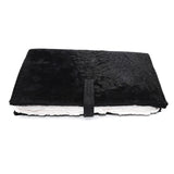Hand stitched matte black reverse horse culatta leather journal cover with a hand forged solid .925 sterling silver buckle closure and multiple pages of 150gsm handmade cotton rag paper. available to buy online from artisanal uk based leather studio atelier skn.
