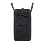 meticulously hand stitched, the washed reverse horse culatta leather phone case features a minimal silhouette, with a distressed iron dye treatment, tonal linen stitching and a card slot to the rear. the phone holder is available to buy online from avant garde designer atelierskn.com 