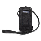 meticulously hand stitched, the washed reverse horse culatta leather phone case features a minimal silhouette, with a distressed iron dye treatment, tonal linen stitching and a card slot to the rear. the phone holder is available to buy online from avant garde designer atelierskn.com 