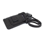 meticulously hand stitched, the washed reverse horse culatta leather phone case features a minimal silhouette, with a distressed iron dye treatment, tonal linen stitching and a card slot to the rear. the phone holder is available to buy online from avant garde designer atelierskn.com 