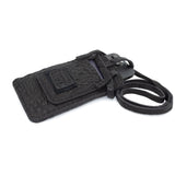 meticulously hand stitched, the washed reverse horse culatta leather phone case features a minimal silhouette, with a distressed iron dye treatment, tonal linen stitching and a card slot to the rear. the phone holder is available to buy online from avant garde designer atelierskn.com 