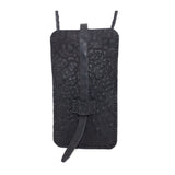 meticulously hand stitched, the washed reverse horse culatta leather phone case features a minimal silhouette, with a distressed iron dye treatment, tonal linen stitching and a card slot to the rear. the phone holder is available to buy online from avant garde designer atelierskn.com 