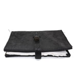 Hand stitched object dyed grey reverse horse culatta leather journal cover with a hand forged solid burnt bronze nail closure, interior pockets and multiple pages of 150gsm handmade cotton rag paper. available to buy online from artisanal uk based leather studio atelier skn.