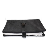 Hand stitched object dyed grey reverse horse culatta leather journal cover with a hand forged solid burnt bronze nail closure, interior pockets and multiple pages of 150gsm handmade cotton rag paper. available to buy online from artisanal uk based leather studio atelier skn.