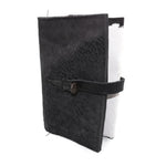 Hand stitched object dyed grey reverse horse culatta leather journal cover with a hand forged solid burnt bronze nail closure, interior pockets and multiple pages of 150gsm handmade cotton rag paper. available to buy online from artisanal uk based leather studio atelier skn.