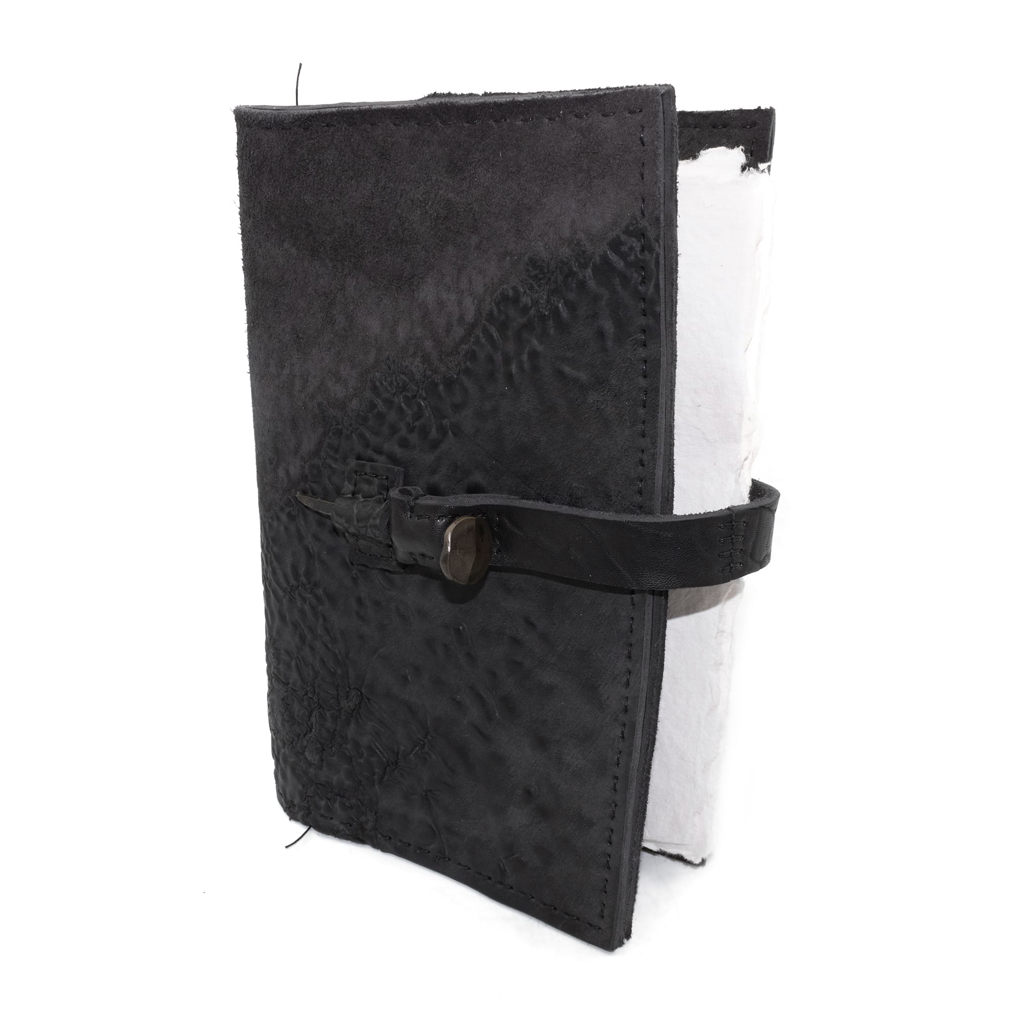 Hand stitched object dyed grey reverse horse culatta leather journal cover with a hand forged solid burnt bronze nail closure, interior pockets and multiple pages of 150gsm handmade cotton rag paper. available to buy online from artisanal uk based leather studio atelier skn.