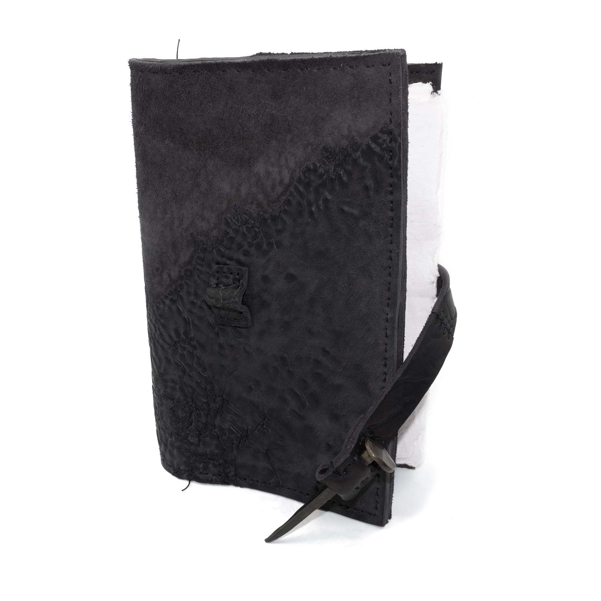 Hand stitched object dyed grey reverse horse culatta leather journal cover with a hand forged solid burnt bronze nail closure, interior pockets and multiple pages of 150gsm handmade cotton rag paper. available to buy online from artisanal uk based leather studio atelier skn.