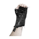 hand stitched over a 40hr period the genuine crocodile leather gloves feature deconstructed open seam panels, and a raw cut vintage french linen lining. with an object dyed finish the gloves are then wet moulded on the body over an 8 hour period for a sculptured aesthetic. the gloves are available to buy online from avant garde leather studio atelierskn.com