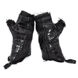 hand stitched over a 40hr period the genuine crocodile leather gloves feature deconstructed open seam panels, and a raw cut vintage french linen lining. with an object dyed finish the gloves are then wet moulded on the body over an 8 hour period for a sculptured aesthetic. the gloves are available to buy online from avant garde leather studio atelierskn.com