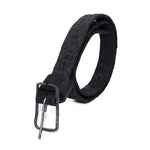 the pyroclastic belt features multiple layers of volcanic ash, sterling silver, burnt bronze layered over 28 days on top of an object dyed matte black full grain reverse horse culatta leather belt. with a hand forged oxidised .925 sterling silver buckle for men and women. expertly hand sewn by independent UK based artisanal designer atelier SKN.