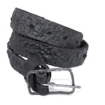 the pyroclastic belt features multiple layers of volcanic ash, sterling silver, burnt bronze layered over 28 days on top of an object dyed matte black full grain reverse horse culatta leather belt. with a hand forged oxidised .925 sterling silver buckle for men and women. expertly hand sewn by independent UK based artisanal designer atelier SKN.