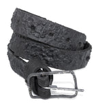 the pyroclastic belt features multiple layers of volcanic ash, sterling silver, burnt bronze layered over 28 days on top of an object dyed matte black full grain reverse horse culatta leather belt. with a hand forged oxidised .925 sterling silver buckle for men and women. expertly hand sewn by independent UK based artisanal designer atelier SKN.
