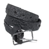 the pyroclastic belt features multiple layers of volcanic ash, sterling silver, burnt bronze layered over 28 days on top of an object dyed matte black full grain reverse horse culatta leather belt. with a hand forged oxidised .925 sterling silver buckle for men and women. expertly hand sewn by independent UK based artisanal designer atelier SKN.
