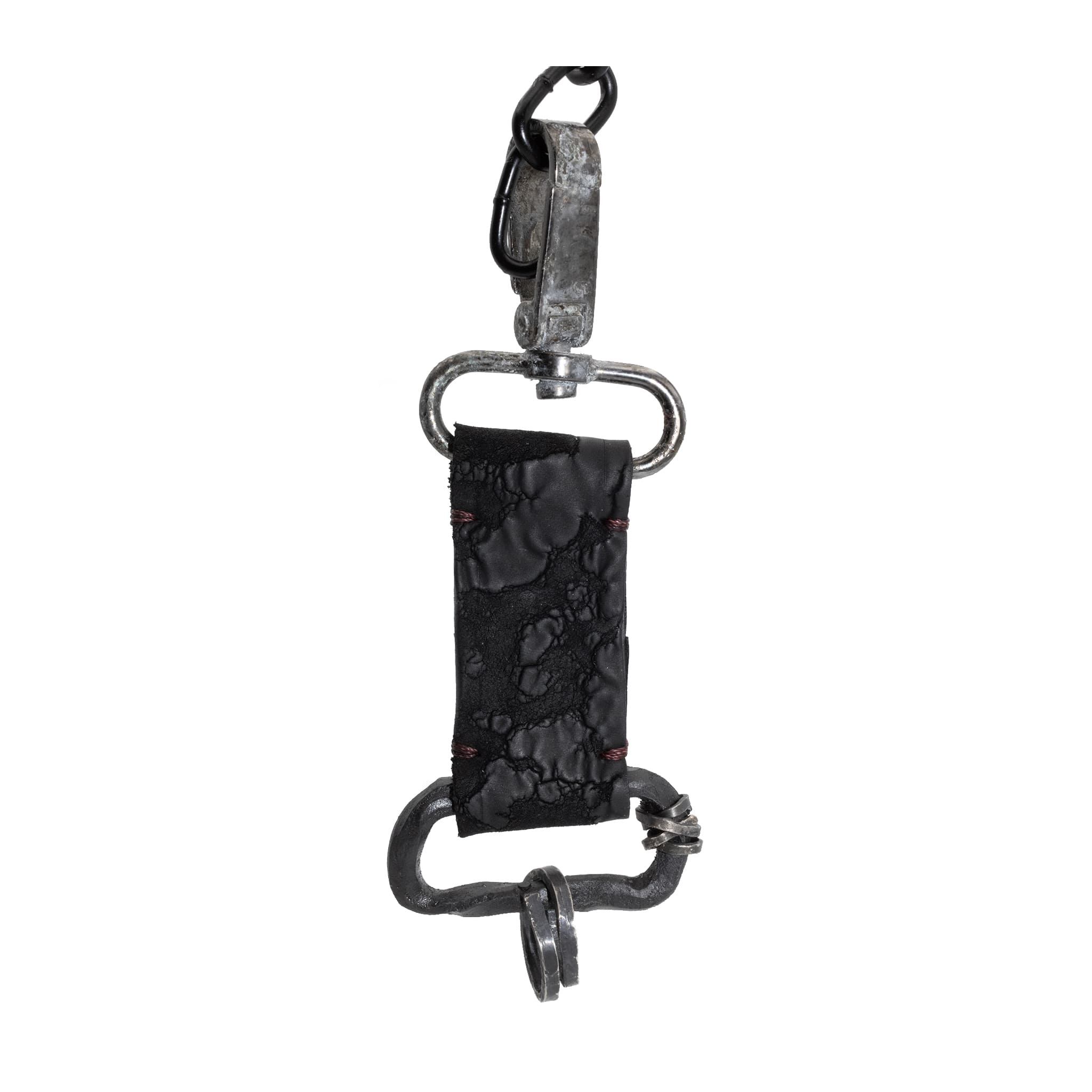 hand stitched with blood dyed thread the black reverse horse culatta leather keychain features a military clip and hand forged iron hardware with .925 sterling silver details.