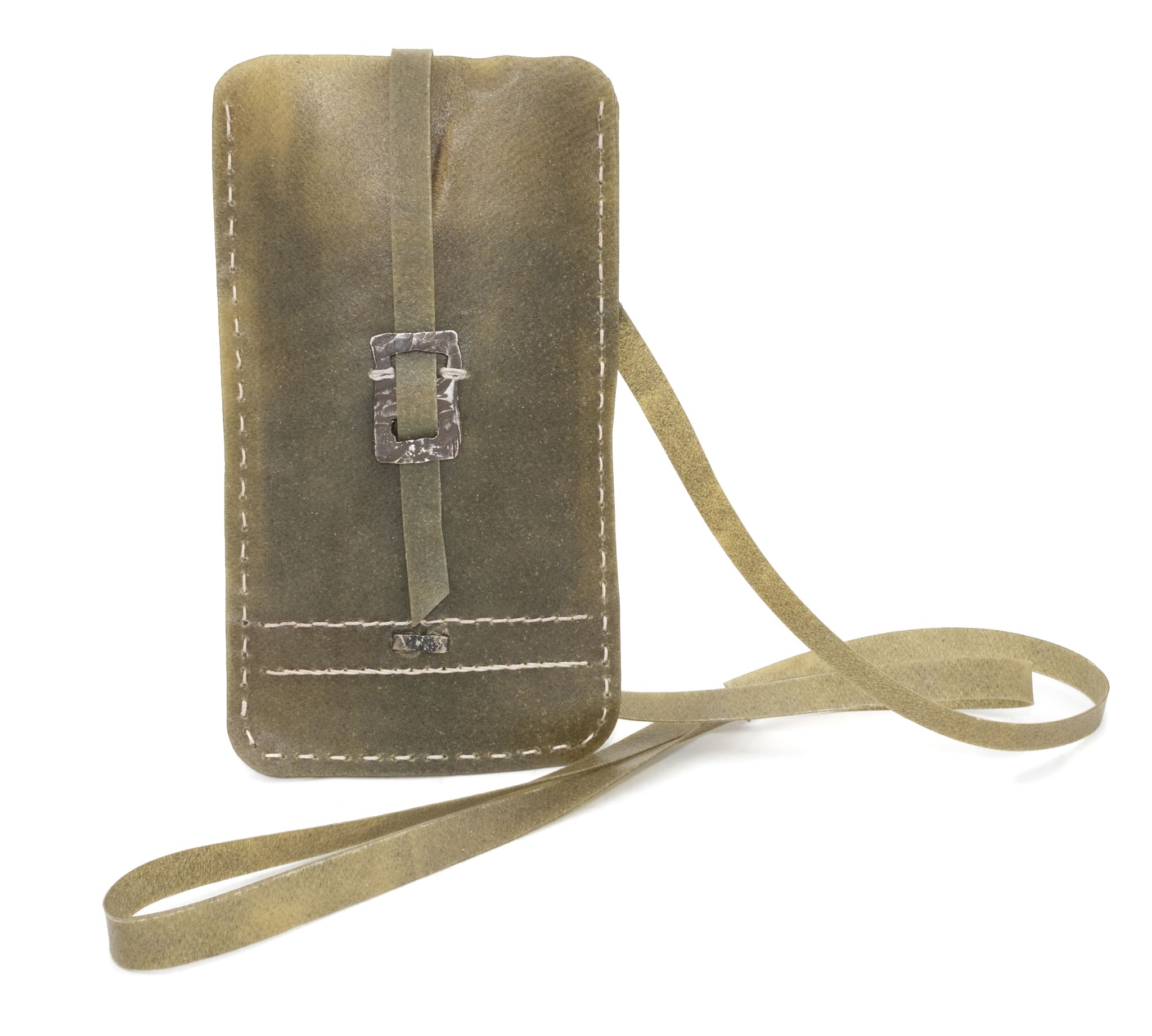 meticulously hand stitched, the transparent horse leather phone case features a minimal silhouette with tonal linen stitching and hand forged .925 sterling silver hardware. the phone holder is available to buy online from avant garde designer atelierskn.com 