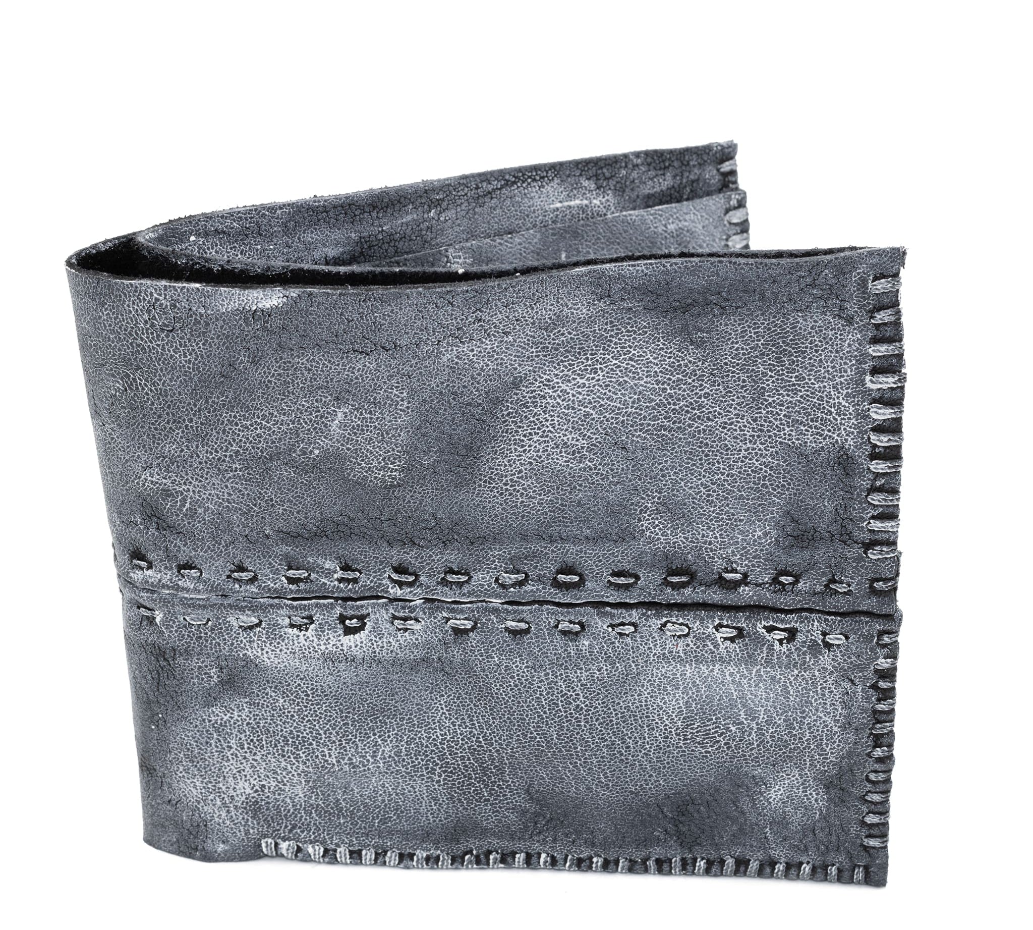 a closed seam 6 pocket bifold wallet crafted from a supple matte black kangaroo leather with a contrasting pigmented wax finish available to buy online from artisanal leather studio atelierskn.com