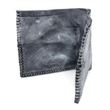 a closed seam 6 pocket bifold wallet crafted from a supple matte black kangaroo leather with a contrasting pigmented wax finish available to buy online from artisanal leather studio atelierskn.com