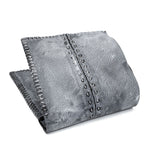 a closed seam 6 pocket bifold wallet crafted from a supple matte black kangaroo leather with a contrasting pigmented wax finish available to buy online from artisanal leather studio atelierskn.com