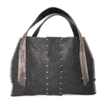 avant garde black leather handbag from atelier skn available to buy online.