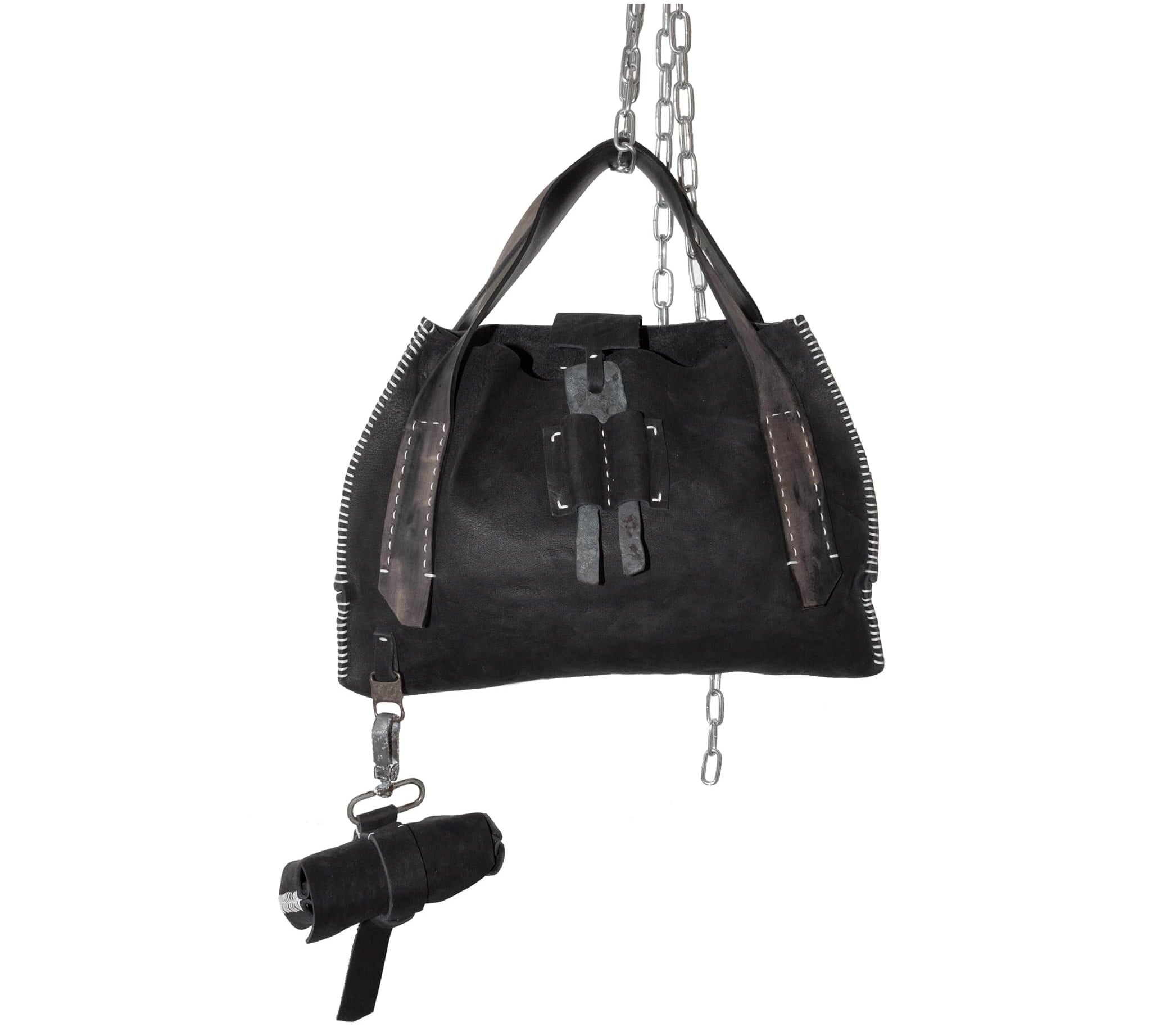avant garde black leather handbag from atelier skn available to buy online.