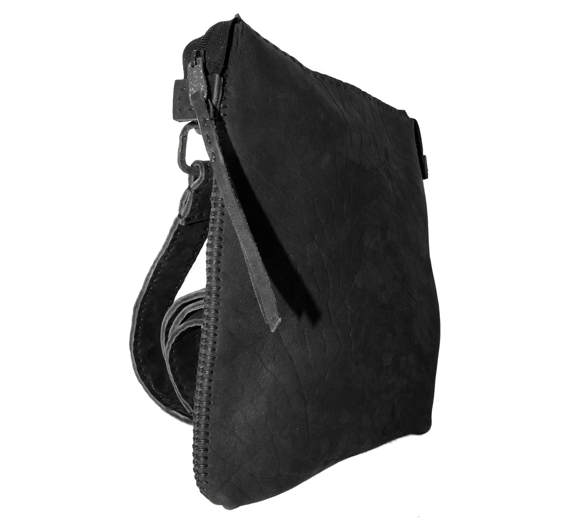 hand sewn avant garde black leather shoulder bag from atelier skn.