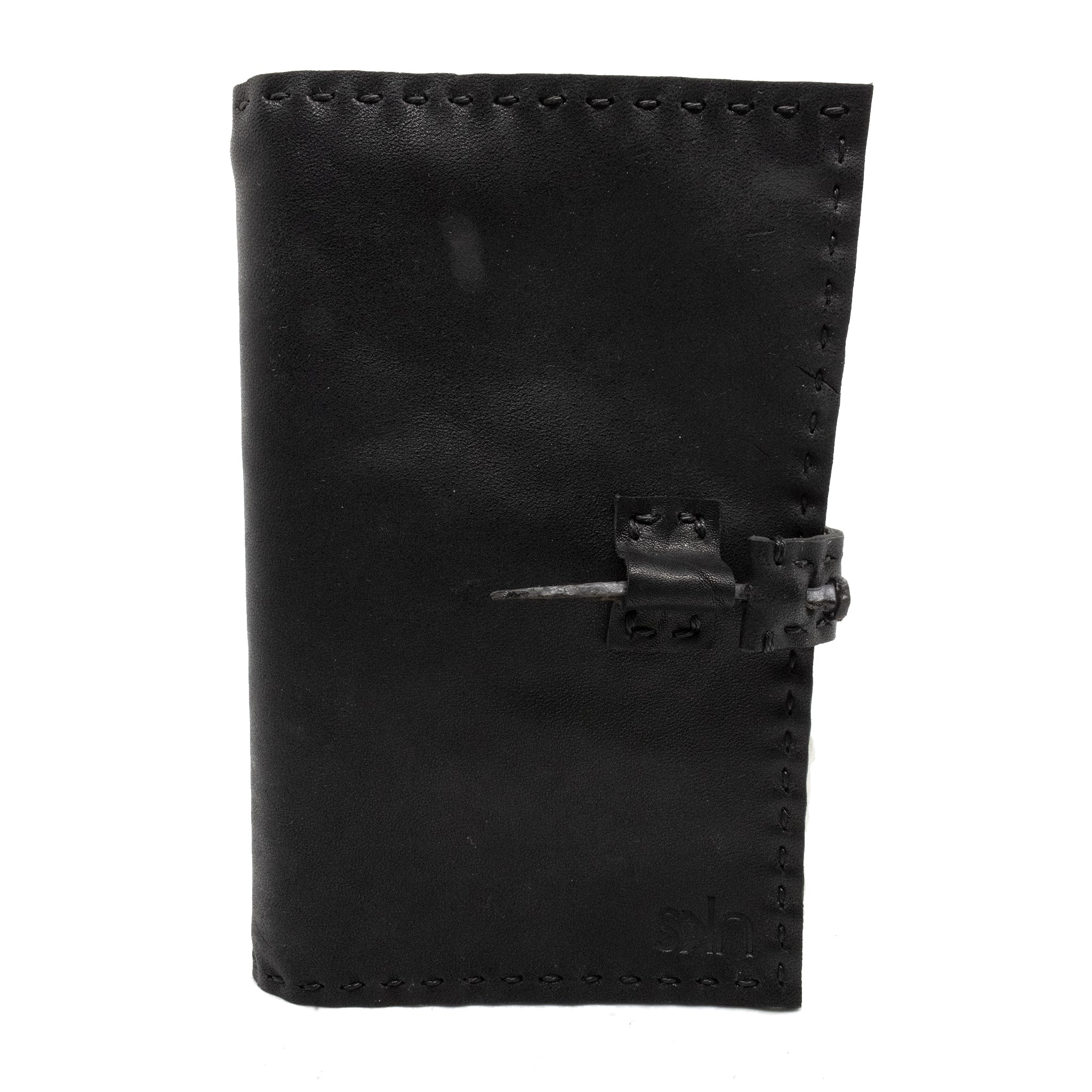 Hand sewn luxury leather journals and diaries available online at atelier skn.